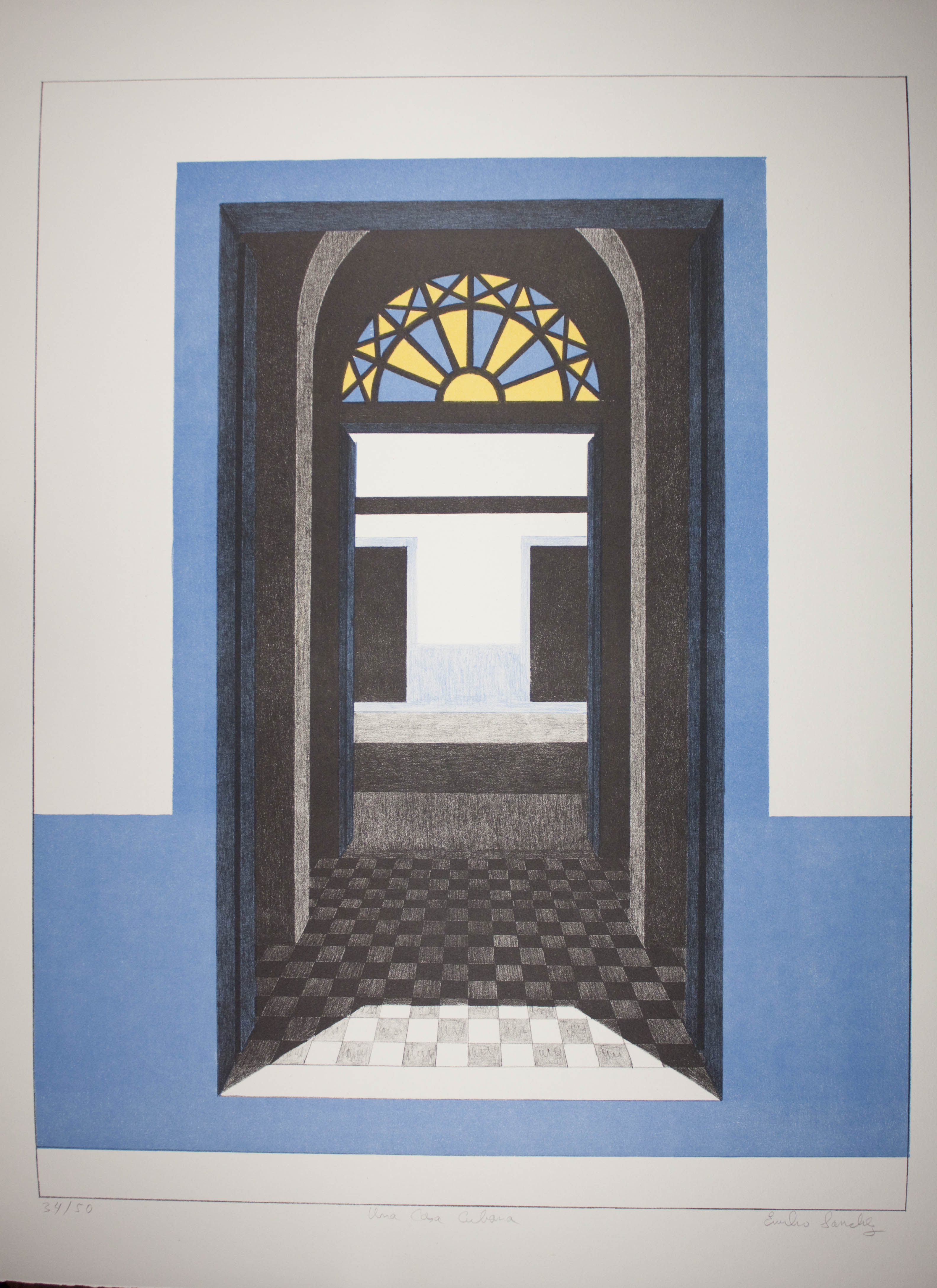An interior doorway framed by bright blue walls, featuring a decorative window and a checkered floor leading to a light-filled space.
